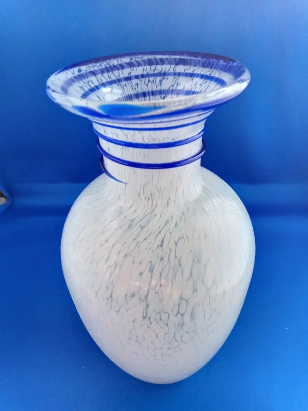 Art glass vase white speckle with blue spiral up neck to the opening  urn shaped